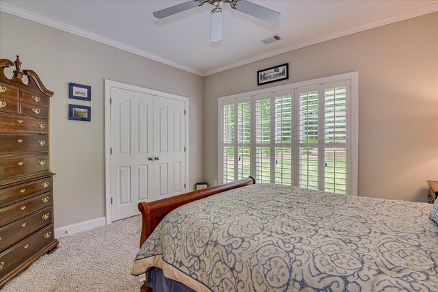 203 Jacque Cir, Mccormick, SC 29835 - carpeted bedroom with a closet, crown molding, baseboards, and a ceiling fan
