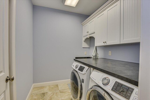 203 Jacque Cir, Mccormick, SC 29835 - washroom featuring separate washer and dryer, cabinet space, and baseboards