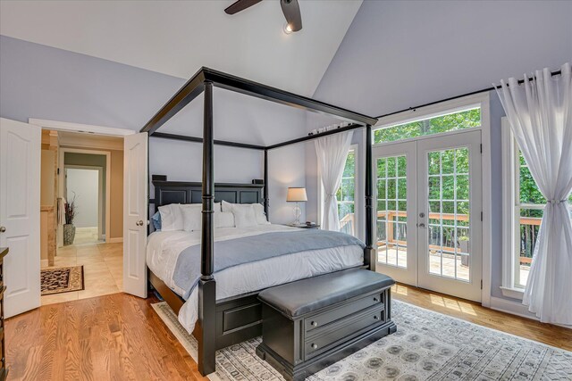 203 Jacque Cir, Mccormick, SC 29835 - bedroom featuring vaulted ceiling, access to outside, french doors, and light wood-style flooring