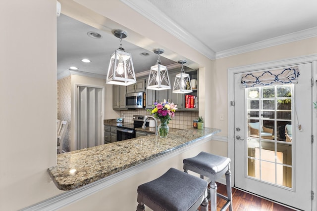 kitchen with tasteful backsplash, crown molding, light stone counters, wood finished floors, and stainless steel appliances