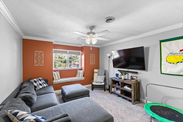 living room featuring visible vents, baseboards, carpet, and ornamental molding