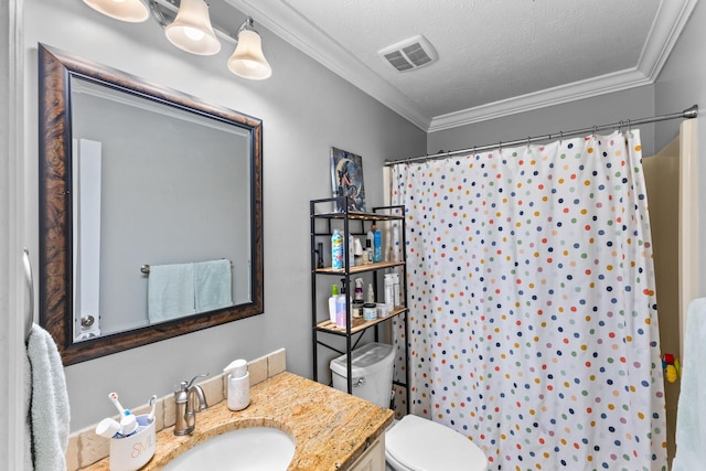 full bathroom with visible vents, toilet, a textured ceiling, crown molding, and vanity