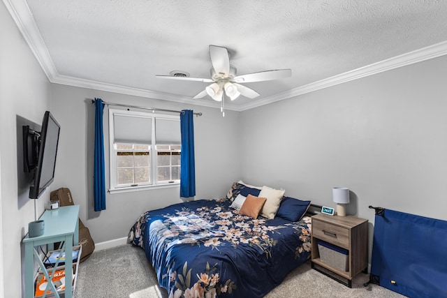 carpeted bedroom featuring ceiling fan, crown molding, baseboards, and a textured ceiling