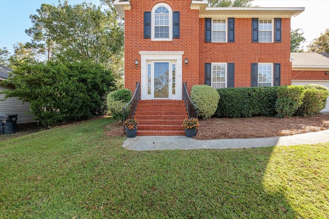 view of front of property with a front lawn