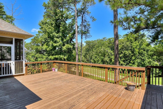 wooden terrace with a sunroom