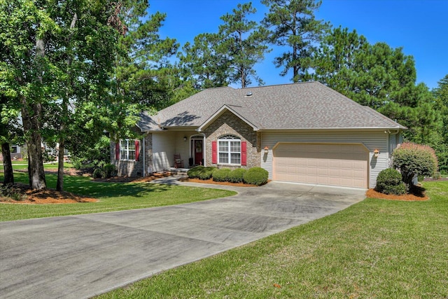 single story home with a garage and a front yard