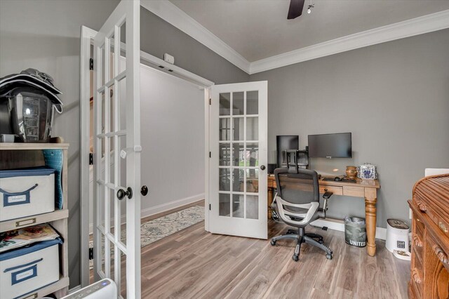 office with french doors, hardwood / wood-style flooring, ceiling fan, and ornamental molding