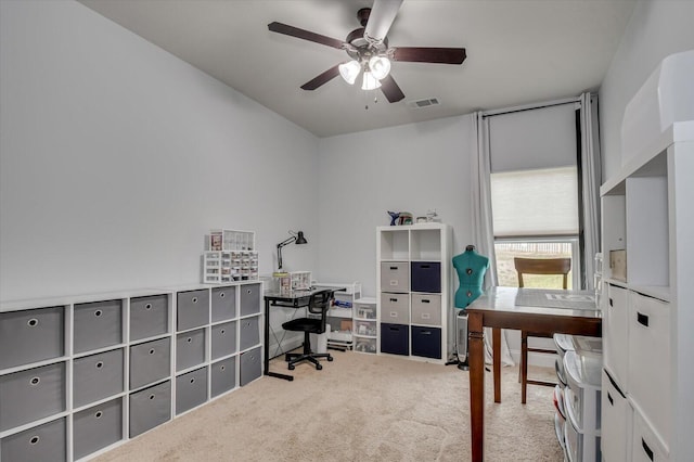 office with ceiling fan and carpet floors