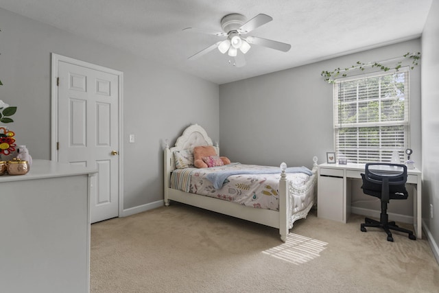 1629 Jamestown Ave, Evans, GA 30809 - bedroom with light carpet, baseboards, and ceiling fan