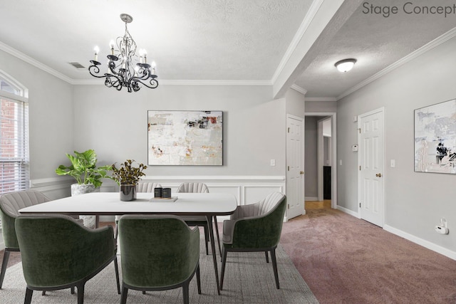 1629 Jamestown Ave, Evans, GA 30809 - dining space featuring a chandelier, light colored carpet, ornamental molding, and wainscoting