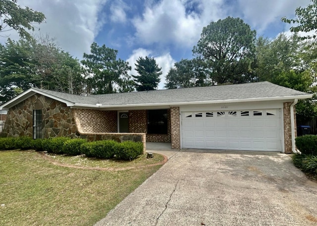 ranch-style home with a garage