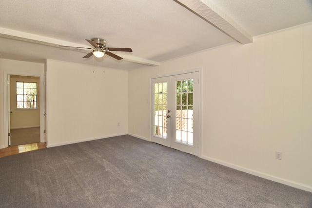 spare room featuring ceiling fan, french doors, beamed ceiling, a textured ceiling, and carpet