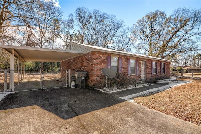 view of front of house with a carport