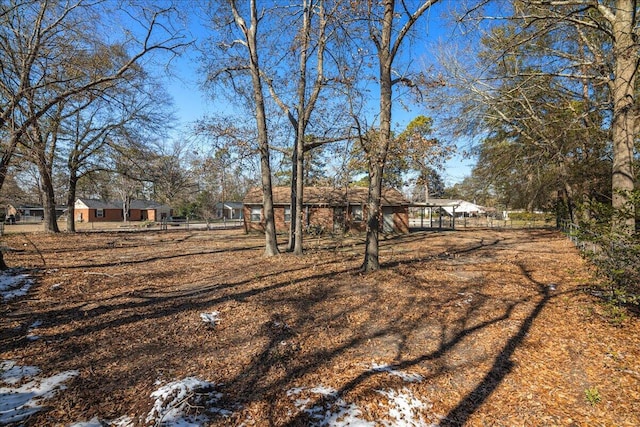 view of yard covered in snow