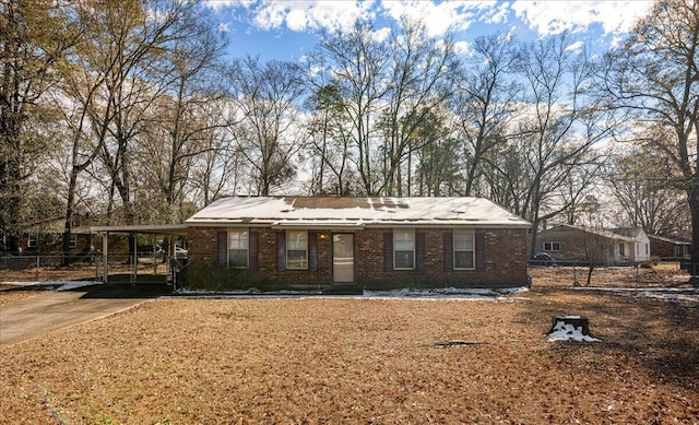 view of front facade featuring a carport