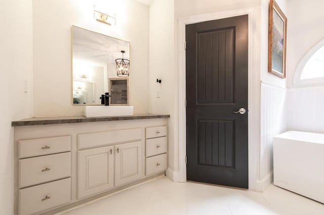 184 Deer Springs Rd, Clarks Hill, SC 29821 - full bathroom featuring vanity, tile patterned flooring, a bathtub, and a wainscoted wall