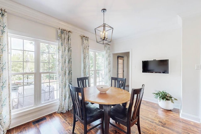 184 Deer Springs Rd, Clarks Hill, SC 29821 - dining room featuring a chandelier, crown molding, wood finished floors, and baseboards