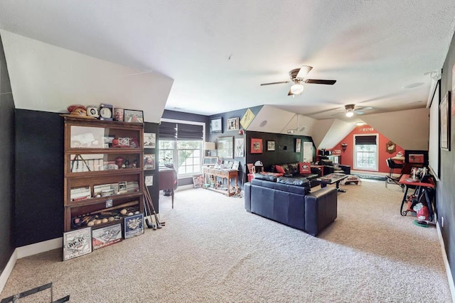 184 Deer Springs Rd, Clarks Hill, SC 29821 - carpeted living area featuring healthy amount of natural light, ceiling fan, lofted ceiling, and baseboards