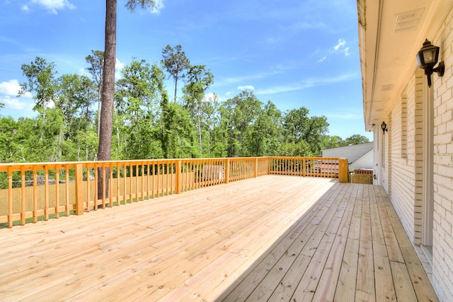 wooden deck with visible vents