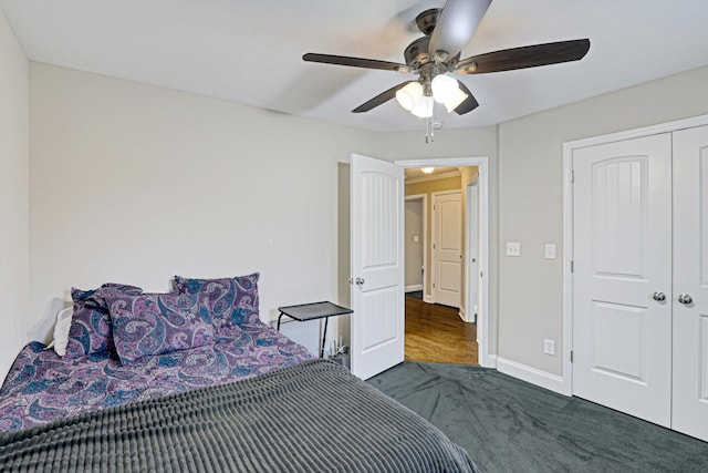 1009 Neilson St, Aiken, SC 29803 - bedroom featuring dark colored carpet, baseboards, a ceiling fan, and a closet
