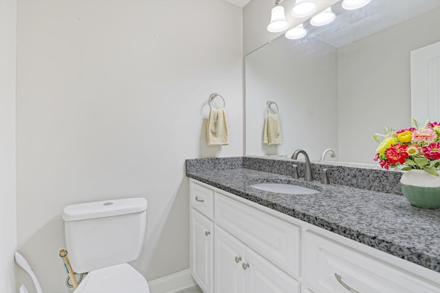 1009 Neilson St, Aiken, SC 29803 - bathroom with vanity, toilet, and baseboards