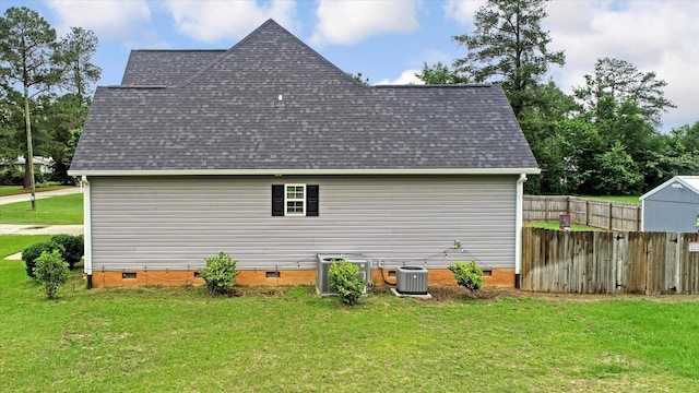 1009 Neilson St, Aiken, SC 29803 - view of side of property featuring a shingled roof, cooling unit, and crawl space