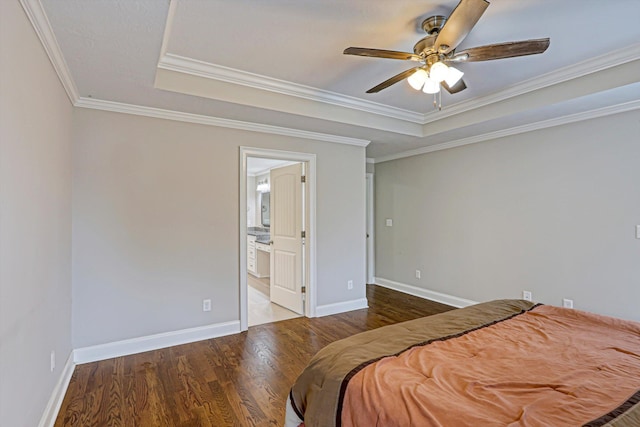 1009 Neilson St, Aiken, SC 29803 - bedroom featuring a raised ceiling, wood finished floors, crown molding, baseboards, and a ceiling fan