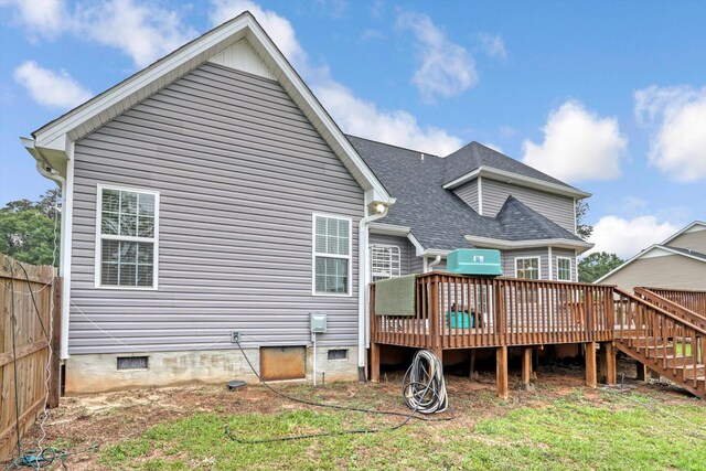 1009 Neilson St, Aiken, SC 29803 - back of property featuring a deck, crawl space, roof with shingles, and stairway