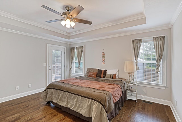 1009 Neilson St, Aiken, SC 29803 - bedroom featuring a raised ceiling, multiple windows, access to outside, baseboards, and crown molding