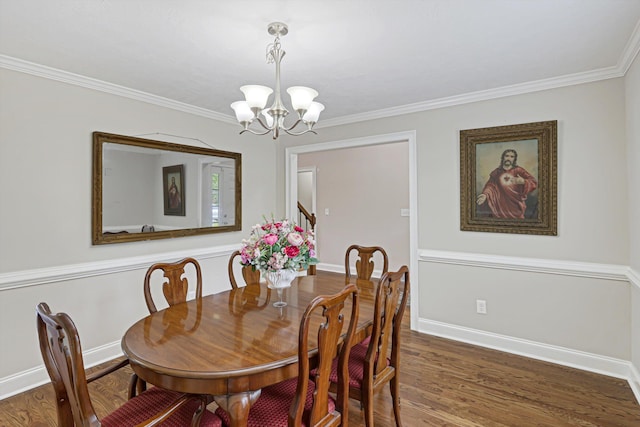 1009 Neilson St, Aiken, SC 29803 - dining area featuring wood finished floors, a chandelier, ornamental molding, and baseboards