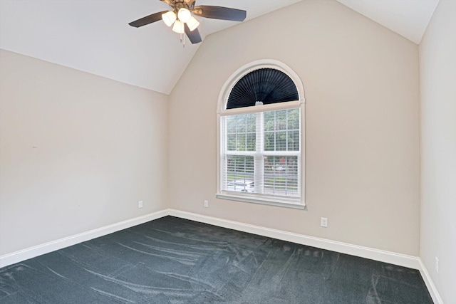 1009 Neilson St, Aiken, SC 29803 - empty room with vaulted ceiling, a ceiling fan, dark colored carpet, and baseboards