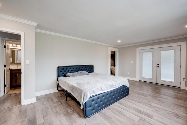 1543 Wrens Hwy, Thomson, GA 30824 - bedroom featuring ornamental molding, baseboards, recessed lighting, french doors, and light wood finished floors