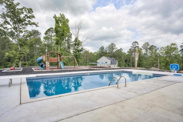 1543 Wrens Hwy, Thomson, GA 30824 - outdoor pool with a diving board, a playground, and a patio area