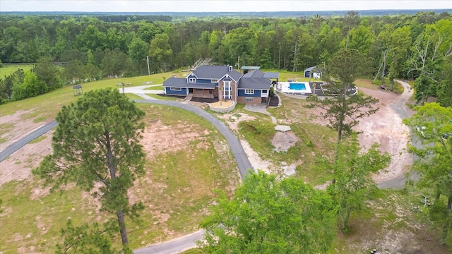1543 Wrens Hwy, Thomson, GA 30824 - birds eye view of property featuring a wooded view