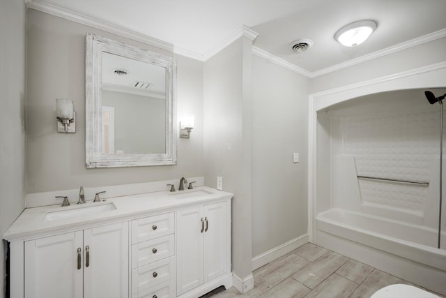 1543 Wrens Hwy, Thomson, GA 30824 - bathroom with a sink, baseboards, ornamental molding, and visible vents