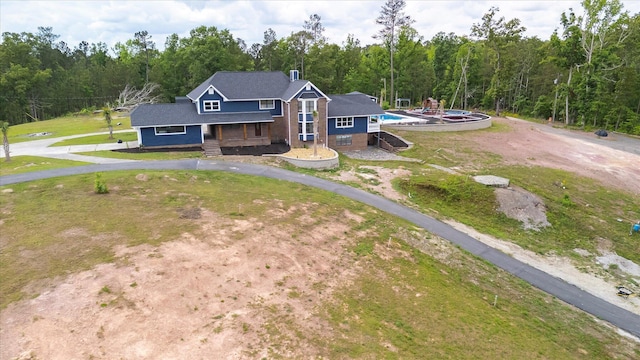 1543 Wrens Hwy, Thomson, GA 30824 - bird's eye view featuring a forest view