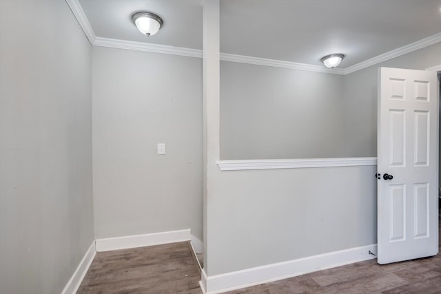 1543 Wrens Hwy, Thomson, GA 30824 - spare room featuring crown molding, baseboards, and wood finished floors