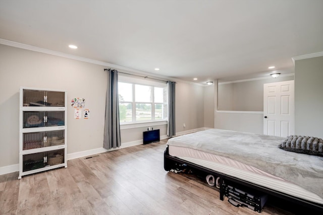 1543 Wrens Hwy, Thomson, GA 30824 - bedroom featuring visible vents, ornamental molding, baseboards, and wood finished floors