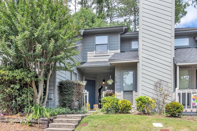 16 Cardinal Ln, North Augusta, SC 29841 - view of front of house featuring a chimney and a shingled roof