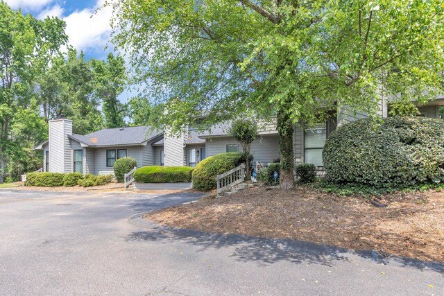 16 Cardinal Ln, North Augusta, SC 29841 - view of front facade featuring a chimney and asphalt driveway
