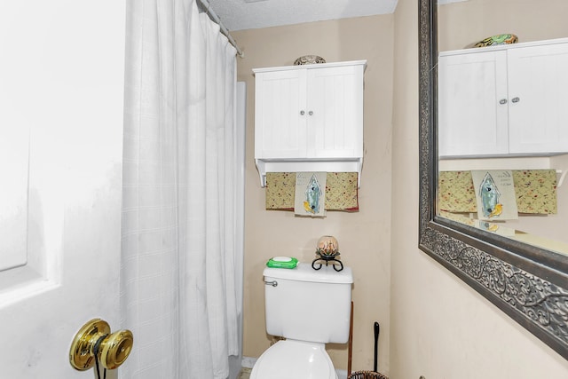 16 Cardinal Ln, North Augusta, SC 29841 - bathroom with toilet and curtained shower