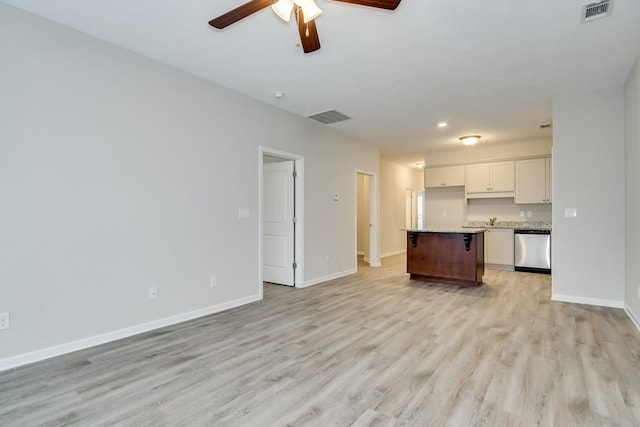 344 Bordeaux Dr, Thomson, GA 30824 - unfurnished living room featuring ceiling fan and light hardwood / wood-style flooring