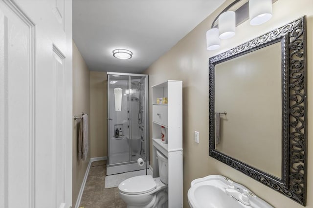 460 Archie Ware Rd, Ridge Spring, SC 29129 - bathroom with a shower stall, toilet, baseboards, and a sink