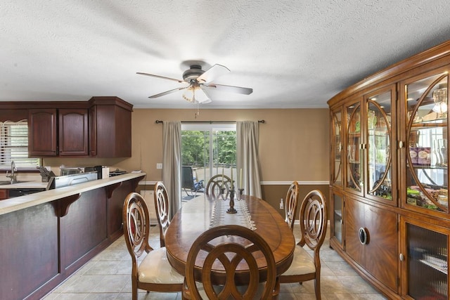 460 Archie Ware Rd, Ridge Spring, SC 29129 - dining area featuring ceiling fan, a textured ceiling, and light tile patterned flooring