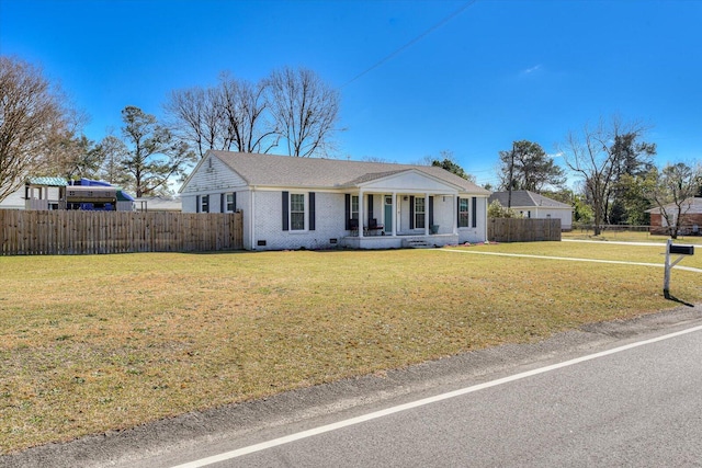 view of front of home featuring crawl space, fence, a front lawn, and brick siding