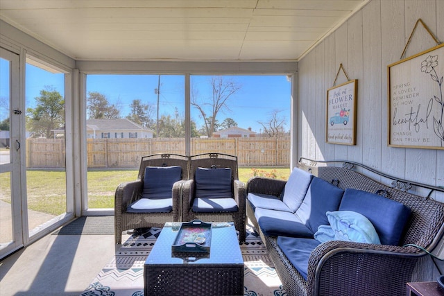 sunroom / solarium featuring a wealth of natural light