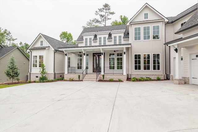 845 Audubon Way, Evans, GA 30809 - modern farmhouse style home with a porch, board and batten siding, concrete driveway, a garage, and crawl space