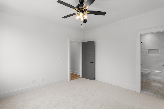 845 Audubon Way, Evans, GA 30809 - unfurnished bedroom featuring carpet floors, crown molding, baseboards, ensuite bath, and ceiling fan