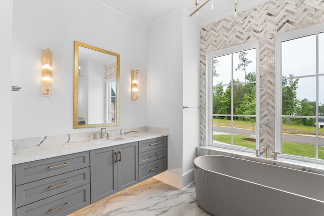 845 Audubon Way, Evans, GA 30809 - full bathroom with ornamental molding, vanity, marble finish floors, healthy amount of natural light, and a soaking tub