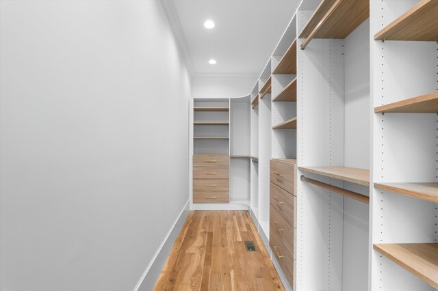 845 Audubon Way, Evans, GA 30809 - spacious closet with built in study area and light wood-style floors